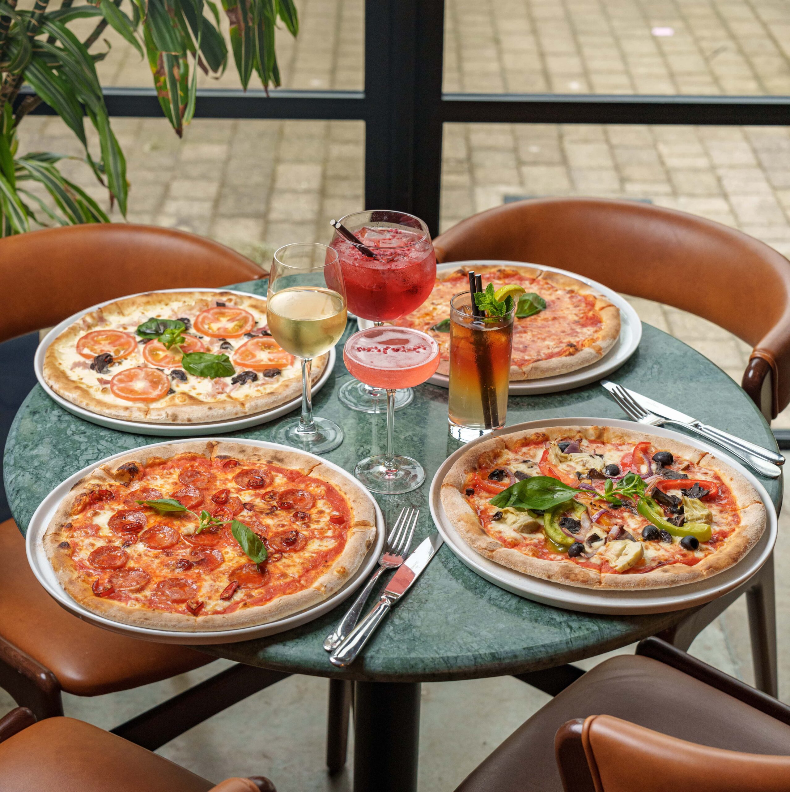 Pizzas and cocktails for your next gathering at Penelope's Italian restaurant in Kent